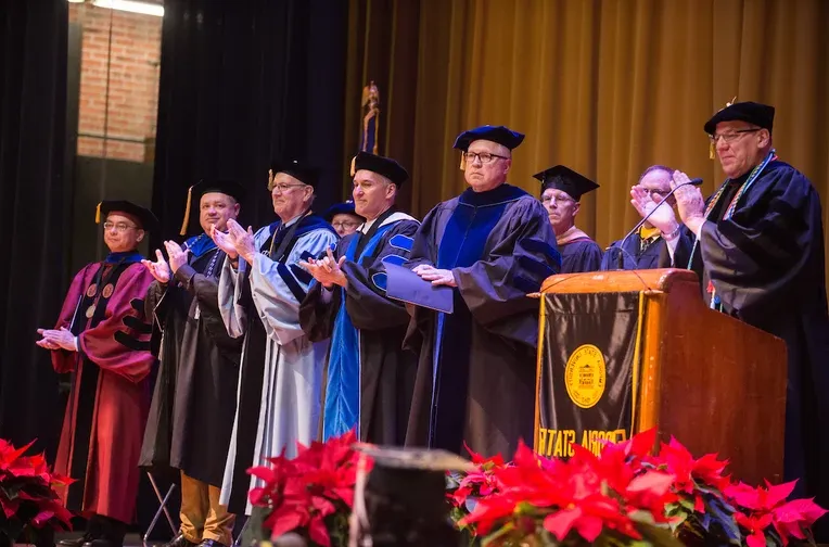 Emporia State faculty and staff at commencement