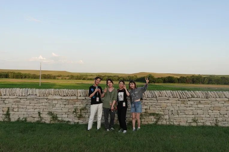 Summer Institute Students pose for photo in the Kansas Flint Hills